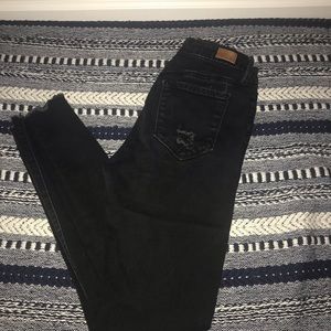 black distressed jeans